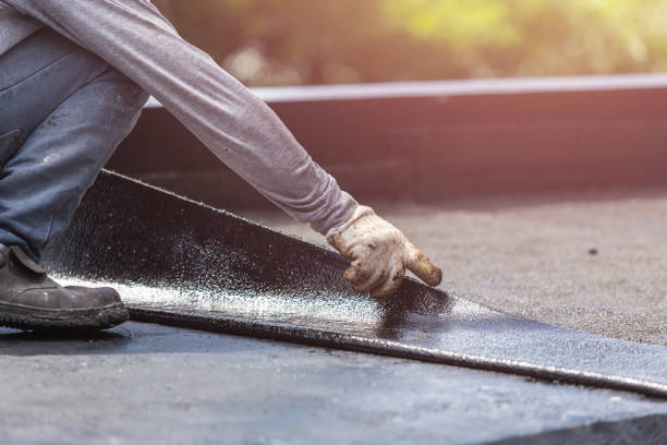 Professional Basement Waterproofing technician working in Medford, MN